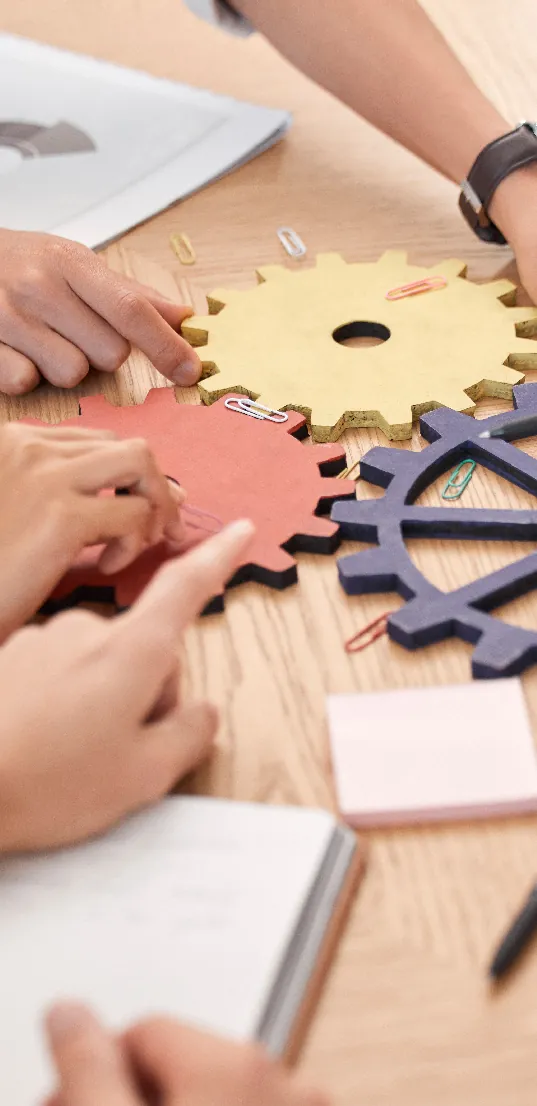 Gears symbolizing teamwork on trademark cases
